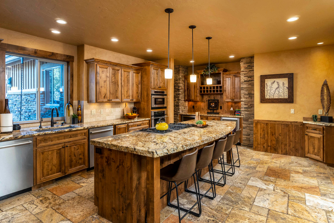 Chef's Kitchen with 12-foot island and premium appliances